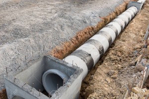 Concrete drainage pipe and manhole.